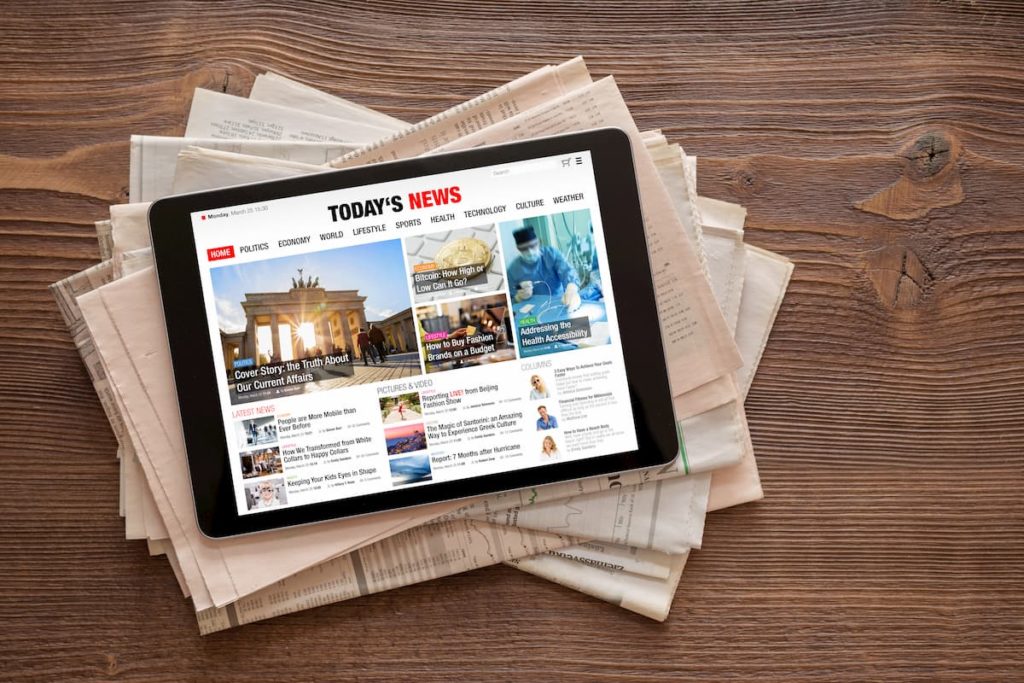 tablet with internet showing sources of economic news