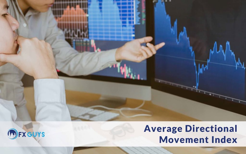 man is explaining Average Directional Movement Index (ADX) on a screen with a chart