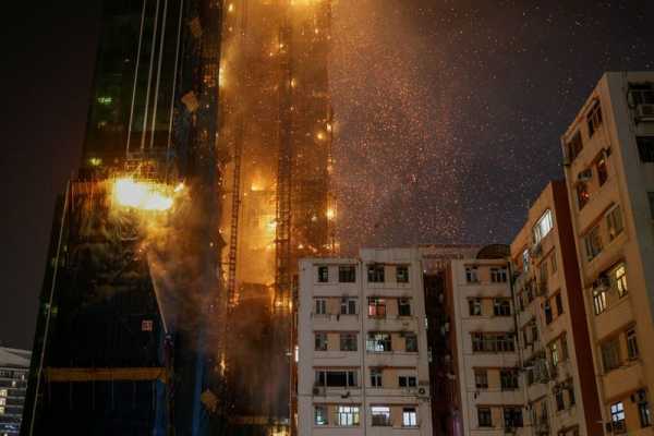 Scores evacuated as fire erupts in Hong Kong skyscraper