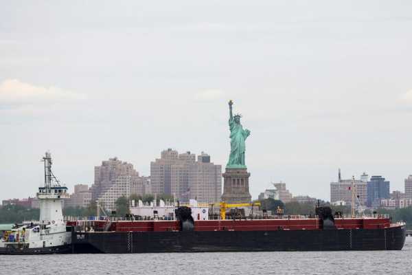 Oil steady as surprise U.S. crude draw counters rate hike jitters