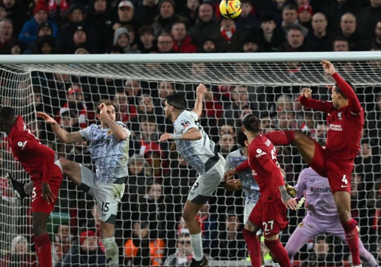 Liverpool tame Wolves to climb into top six