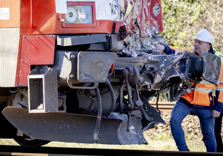 One dead, many hurt as Dutch train hits crane