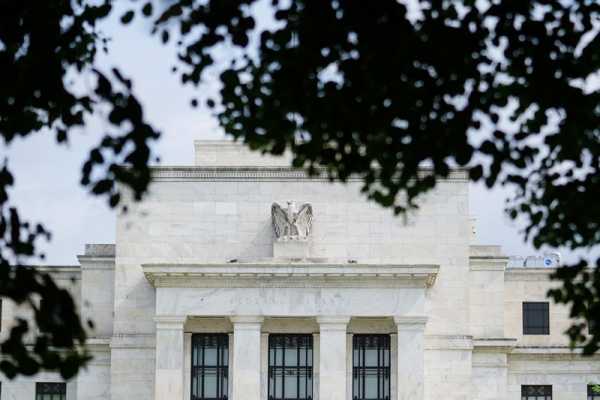 Bank deposits edge up after record outflows, Fed data shows