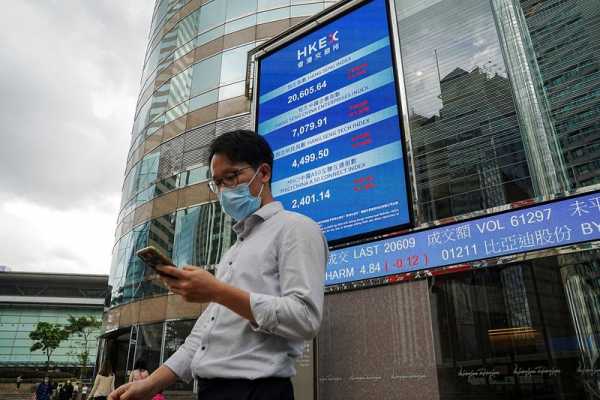 Asian shares muted, dollar buoyant on odds of rate rise