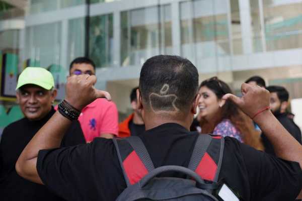 Apple opens first India store as fans show off vintage devices, take selfies