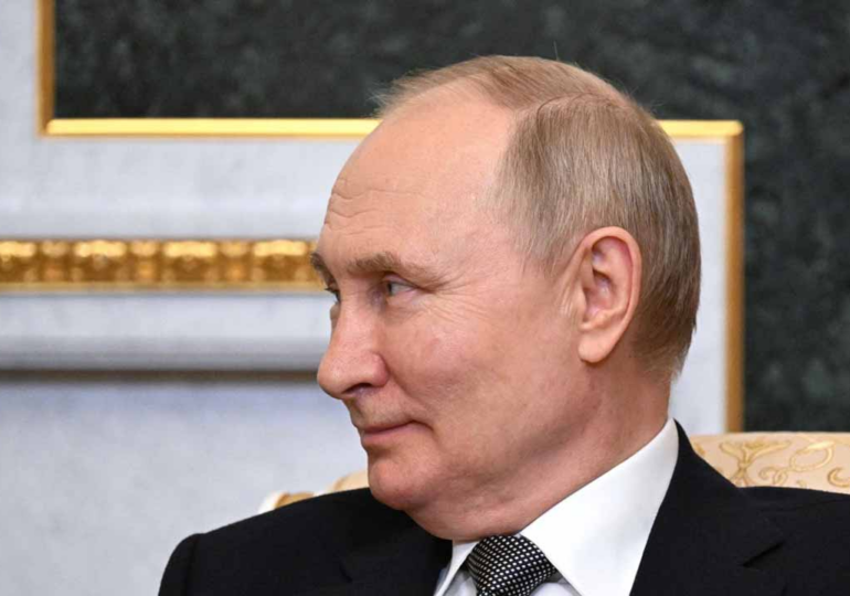 Putin urges Russians to vote at 'difficult' time for country