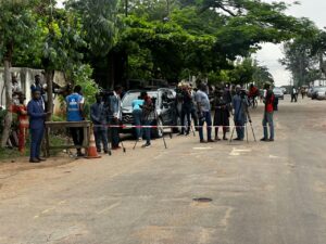 Journalists behind the barricade.. PHOTO: ENIOLA DANIEL